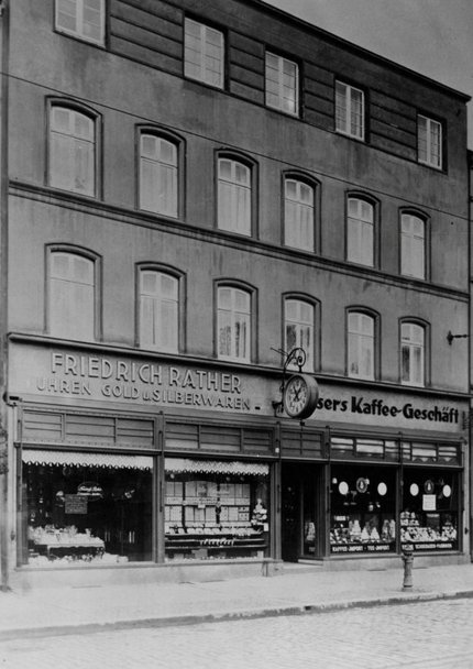 Historic storefront of the Friedrich Rather shop in Harburg, offering clocks, jewelry, and silverware.